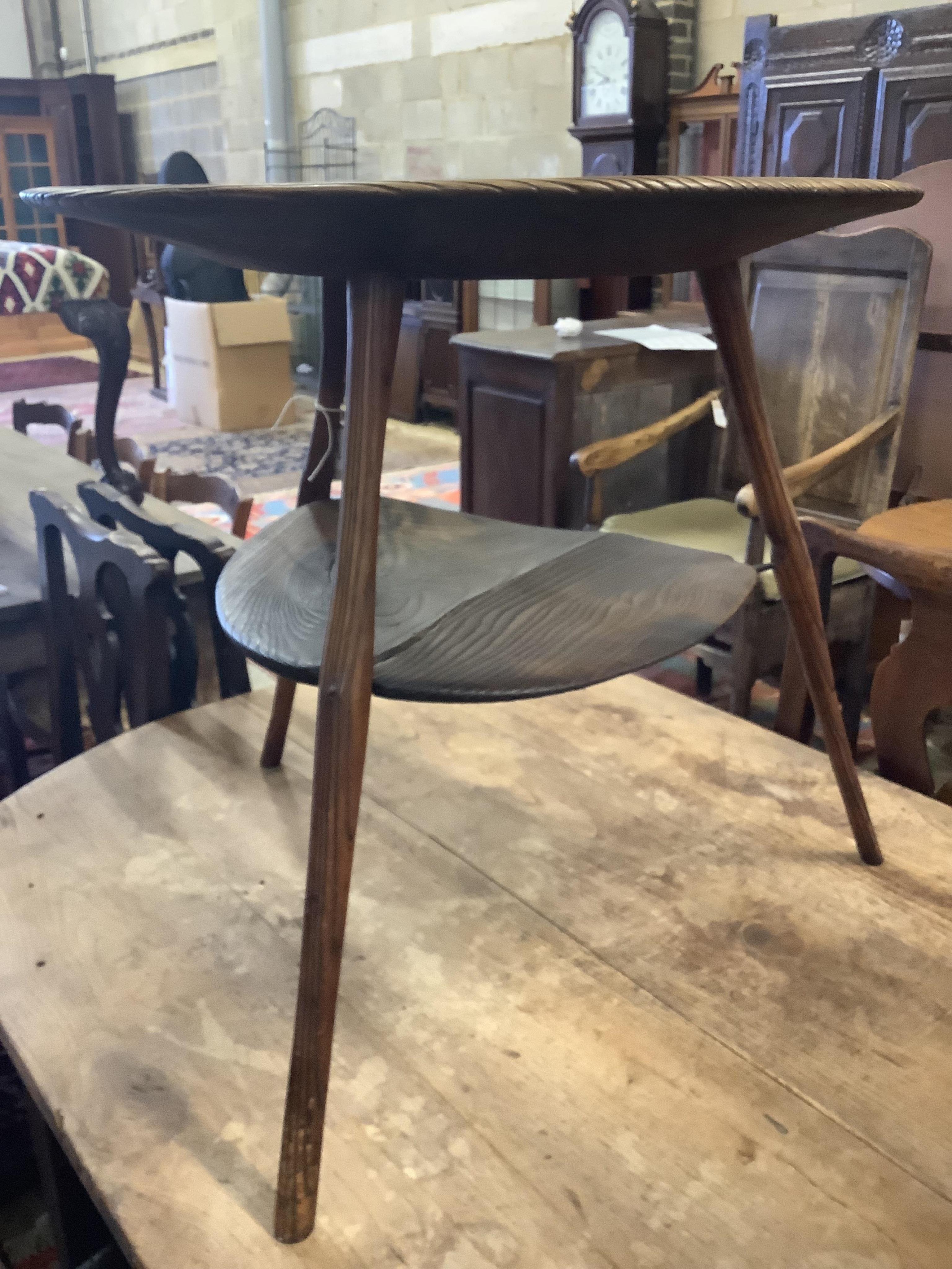 An unusual 18th century weathered elm cricket table, width 61cm, height 60cm. Condition - fair to good